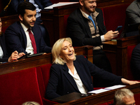 In Paris, France, on March 12, 2024, Marine Le Pen, president of the Rassemblement National group, is laughing during the Prime Minister's s...