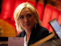 In Paris, France, on March 12, 2024, Marine Le Pen, president of the Rassemblement National group, is showing a paper that says ''Prime-Mini...