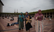 Indonesian Muslims are gathering for free iftar meals on the second day of the holy month...