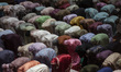 Indonesian Muslims are offering the evening mass prayer, known as Tarawih, on the second d...