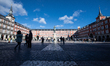 Tourists are appreciating and visiting the Plaza Mayor, which dates back to the 15th centu...