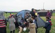 Every days at the Idomeni camp, migrants or refugees wait in the queue for a distribution...