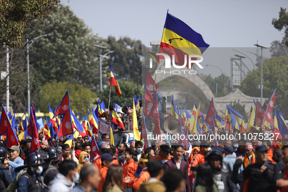 Monarchy supporters are waving Nepal's national flag and the flag of the Rastriya Prajatantra Party-Nepal during a rally organized in Kathma...