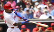 Philadelphia Phillies third baseman Edmundo Sosa (33) is swinging during his at-bat agains...