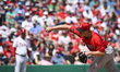 Boston Red Sox relief pitcher Josh Winckowski (25) is throwing to second base against the...