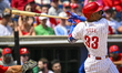 Philadelphia Phillies third baseman Edmundo Sosa (33) is swinging during his at-bat agains...