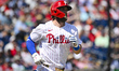 Philadelphia Phillies first baseman Bryce Harper (3) is running to first base against the...
