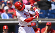 Philadelphia Phillies second baseman Whit Merrifield (9) is swinging during his at-bat aga...