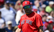 Boston Red Sox Bench Coach Ramon Vazquez (60) is watching the players on the field against...