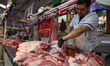 PUEBLA, MEXICO - DECEMBER 7: A stand with meat for sale at the local market in the histor...