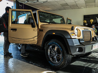 The 4X4 Thar Earth Edition is being showcased in a new golden color at a Mahindra showroom in Srinagar, Jammu and Kashmir, India, on March 1...