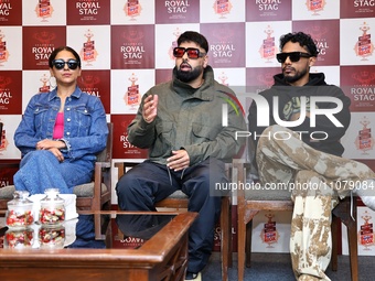 Singer Neeti Mohan is posing with rappers Badshah and Dino James at the press conference of Seagram's Royal Stag BoomBox Music Festival in J...