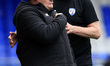 Micky Mellon, the team manager of Oldham Athletic Association Football Club, and Paul Cook...