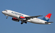 An Airbus A320-232 from AirSerbia is taking off from Barcelona Airport in Barcelona, Spain...