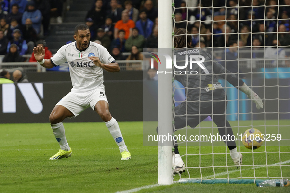 Juan Jesus of Napoli is scoring their first goal during the Serie A soccer match between Inter FC and SSC Napoli at Stadio Meazza in Milan,...
