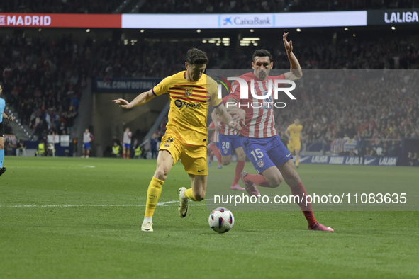 Robert Lewandowski of Barcelona is playing in the match between Atletico Madrid and Barcelona at the Metropolitano Stadium in Madrid, on Mar...