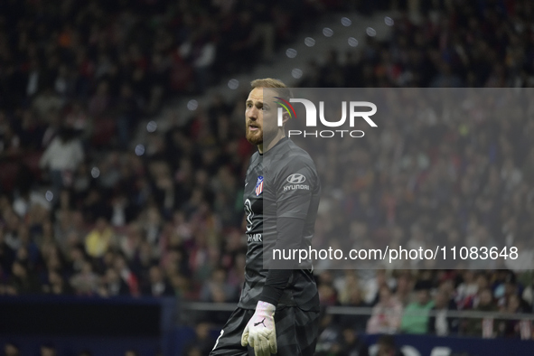 Jan Oblak, the goalkeeper for Barcelona, is playing during the La Liga soccer match between Atletico Madrid and Barcelona at the Metropolita...
