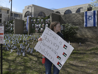 Pro-Palestine demonstrators are setting up a ''kibbutz,'' and Pro-Israel supporters are placing flags in front of the Israeli Embassy today,...