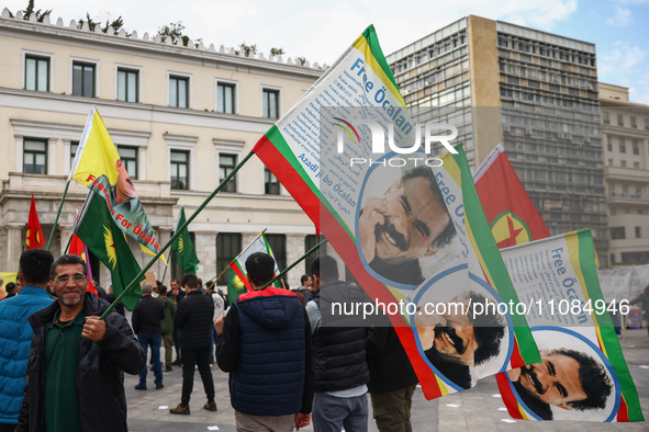 Protestors hold flags during anti-racist rally in Athens, Greece on March 16th, 2024. A few days before the World Day Against Racial Discrim...