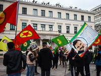 Protestors hold flags and banners during anti-racist rally in Athens, Greece on March 16th, 2024. A few days before the World Day Against Ra...