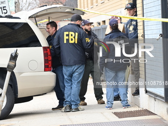 FBI agents are collecting evidence at a warehouse in Mount Vernon, New York, United States, on March 20, 2024, following a double homicide....