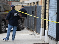 FBI agents are collecting evidence at a warehouse in Mount Vernon, New York, United States, on March 20, 2024, following a double homicide....