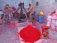 Workers are preparing eco-friendly colored powder 'Gulal' at the Balaji International factory ahead of the Holi festival in Jaipur, Rajastha...