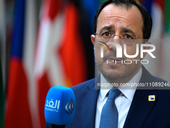 Cyprus President Nikos Christodoulides is talking to the media as he arrives for the European Council Summit in Brussels, Belgium, on March...