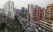 Residents are stuck in a traffic jam on a flyover in Dhaka, Bangladesh, on March 21, 2024....