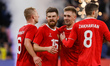 (L to R) Dmitriy Barinov, Danil Glebov, Yuri Gorshkov and Arsen Zakharyan of Russia celebr...