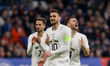 (L to R) Mijat Gacinovic, Dusan Tadic and Andrija Zivkovic of Serbia react during the inte...