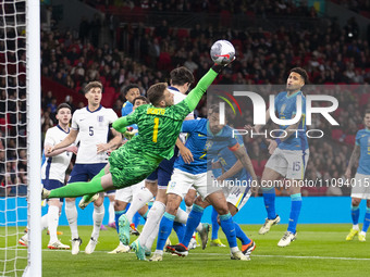 Bento #1 (GK) of Brazil is making a save during the International Friendly match between England and Brazil at Wembley Stadium in London, on...