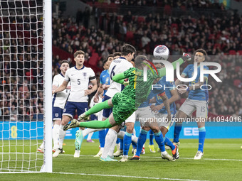 Bento #1 (GK) of Brazil is making a save during the International Friendly match between England and Brazil at Wembley Stadium in London, on...