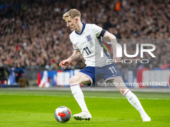 Anthony Gordon #11 of England is playing during the International Friendly match between England and Brazil at Wembley Stadium in London, on...