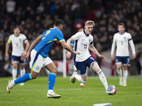 Anthony Gordon #11 of England is in action during the International Friendly match between England and Brazil at Wembley Stadium in London,...