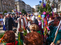 People attend traditional Palm Sunday celebration at the Main Square in Krakow, Poland on March 24, 2024. During Palm Sunday, which is also...