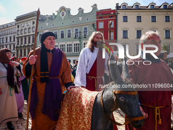 Actors dressed as biblical characters  attend traditional Palm Sunday celebration at the Main Square in Krakow, Poland on March 24, 2024. Du...