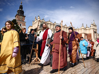 Actors dressed as biblical characters  attend traditional Palm Sunday celebration at the Main Square in Krakow, Poland on March 24, 2024. Du...