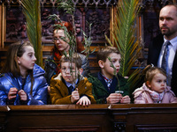 People attend traditional Palm Sunday celebration at St. Francis' Basilica in Krakow, Poland on March 24, 2024. During Palm Sunday, which is...