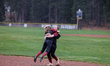Members of Nevada Union and Bear River high schools are playing softball during storms in...