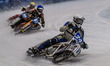 Finland's Max Koivula (24) in white is leading Germany's Markus Jell (82) in blue and Aust...