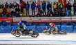 Sweden's Martin Haarahiltunen (199) in blue is passing Germany's Max Niedermaier (88) in t...