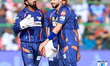 Lucknow Super Giants' players are celebrating a wicket of a Rajasthan Royals batsman durin...