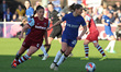 Jelena Cankovic of Chelsea Women is holding off Amber Tysiak of West Ham United WFC during...