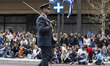 People are attending the military parade marking Greece's Independence Day in central Athe...