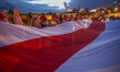 Members of Belarusian diaspora and supporters attend a march organized on 'Freedom Day' on...