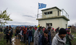 Migrants trek towards Macedonia after leaving the Idomeni refugee camp, on March 14, 2016...