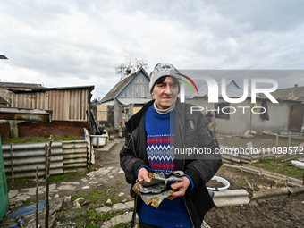 A resident is living in the frontline village of Prymorske, Zaporizhzhia, southeastern Ukraine, on March 20, 2024. (