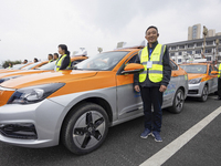 New energy taxis are being put into operation in Yichang, Hubei Province, China, on March 26, 2024. (