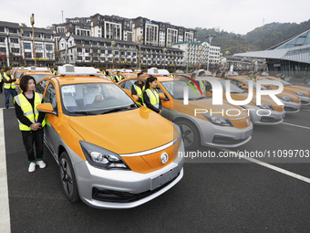 New energy taxis are being put into operation in Yichang, Hubei Province, China, on March 26, 2024. (